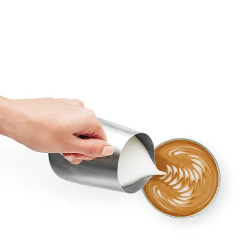 the Barista Express Espresso Machine in Brushed Stainless Steel micro-foam milk texturing